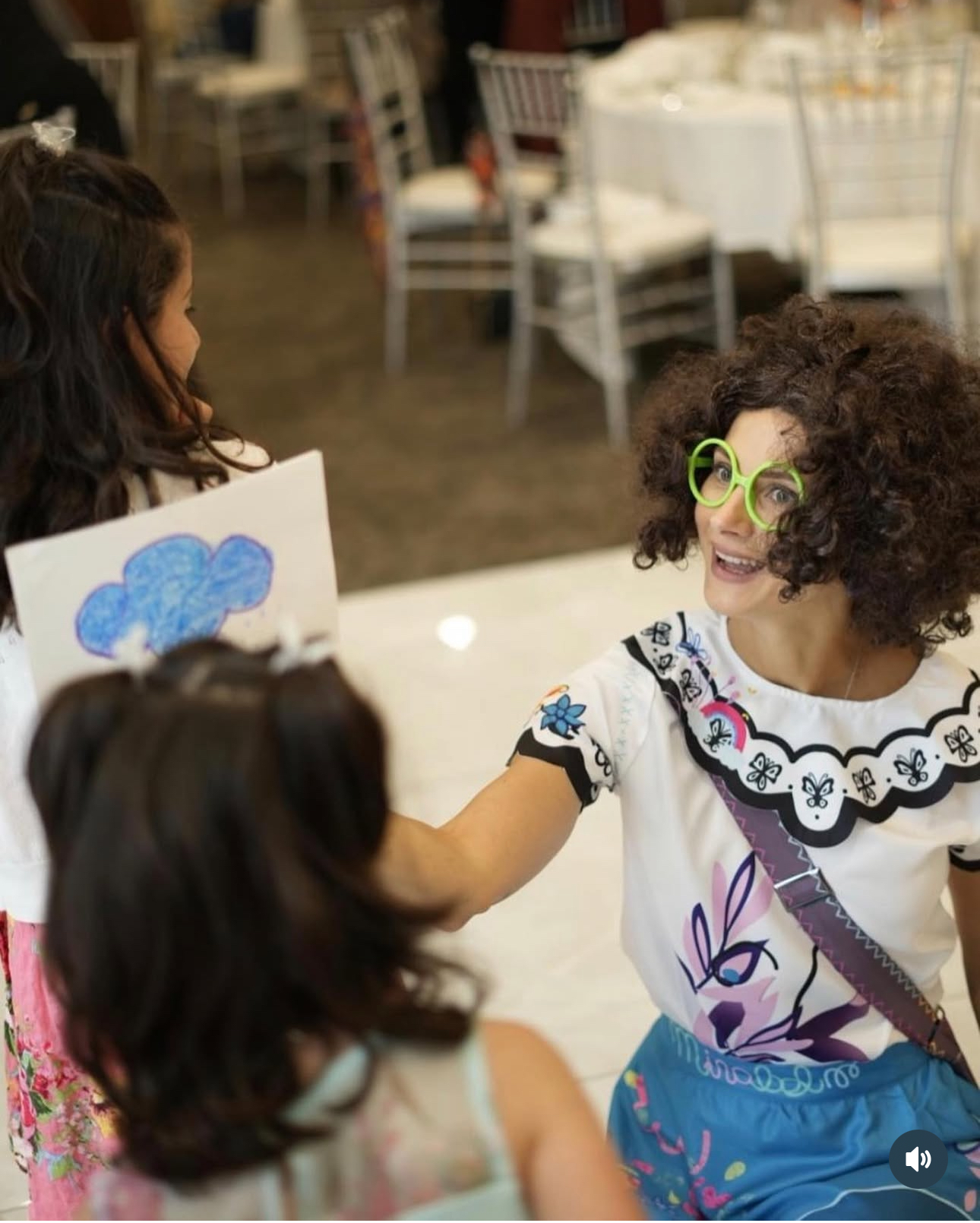 Mirabel-inspired entertainer interacting with children at a birthday party