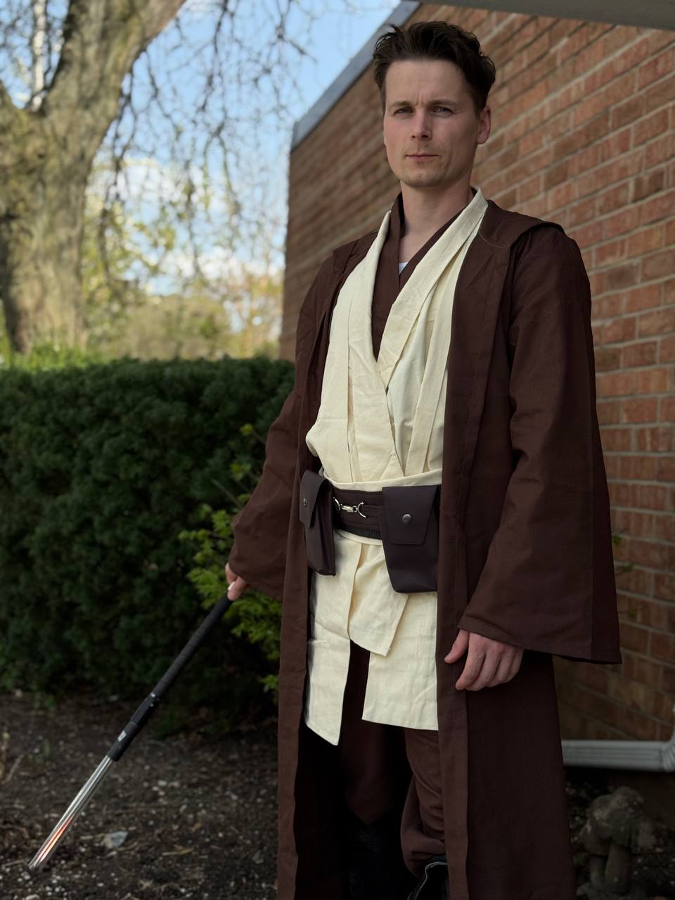 Jedi character entertainer with a lightsaber for Star Wars themed kids party