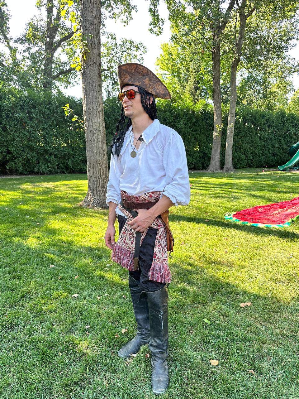 Male pirate kids party entertainer at outdoor birthday party in the Chicago suburbs
